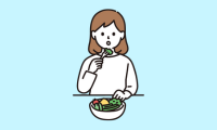 食事している女性